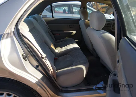 2001 Buick Century Custom z USA, uszkodzony, nr VIN 2G4WS52J011214849